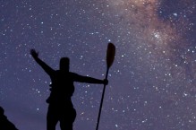 Sea kayaker celebrates the Milky Way, Isla Carmen, Baja, Mexico.