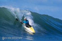 Jonathan Fortner kayak surfing at Santa Cruz Kayak Surf Festival, Santa Cruz, CA. (MR).