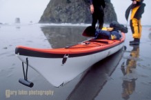 Kayak damage, on Olympic coast. Olympic National Park, Wahsington State.