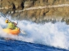 Brooke Winger. Surfing close-in to the cliffs on a small wave day.