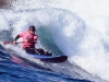 Mike Johnson. Surf kayak designer Mike Johnson on a wave ski.