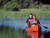 Quiet water canoeing on the Deschutes River in Sun River, Oregon.