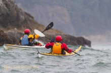 Sea kayakers near Alexander Island, Olympic National Park, Washington State.