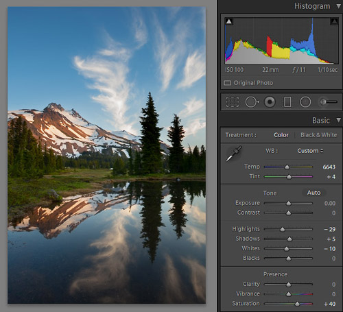 Image 2. Basic adjustments, warmed white balance (Temp), increased saturation, selective adjustment brush with -1 exposure to match sky and mountain to reflected exposure.