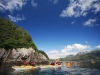 Taylor Bay. Sea kayakers from the Home Shore cherry-pick a paddle in Taylor Bay, AK.