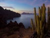 Isla Danzante at sunset, from saddle. Isla Carmen, our circumnavigated island, is in the distance.